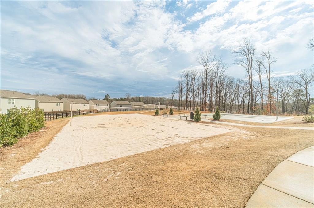 222 Knightsbridge Lane Winder, GA 30680 - Photo 36 of 39 a view of beach with swimming pool and trees in the background