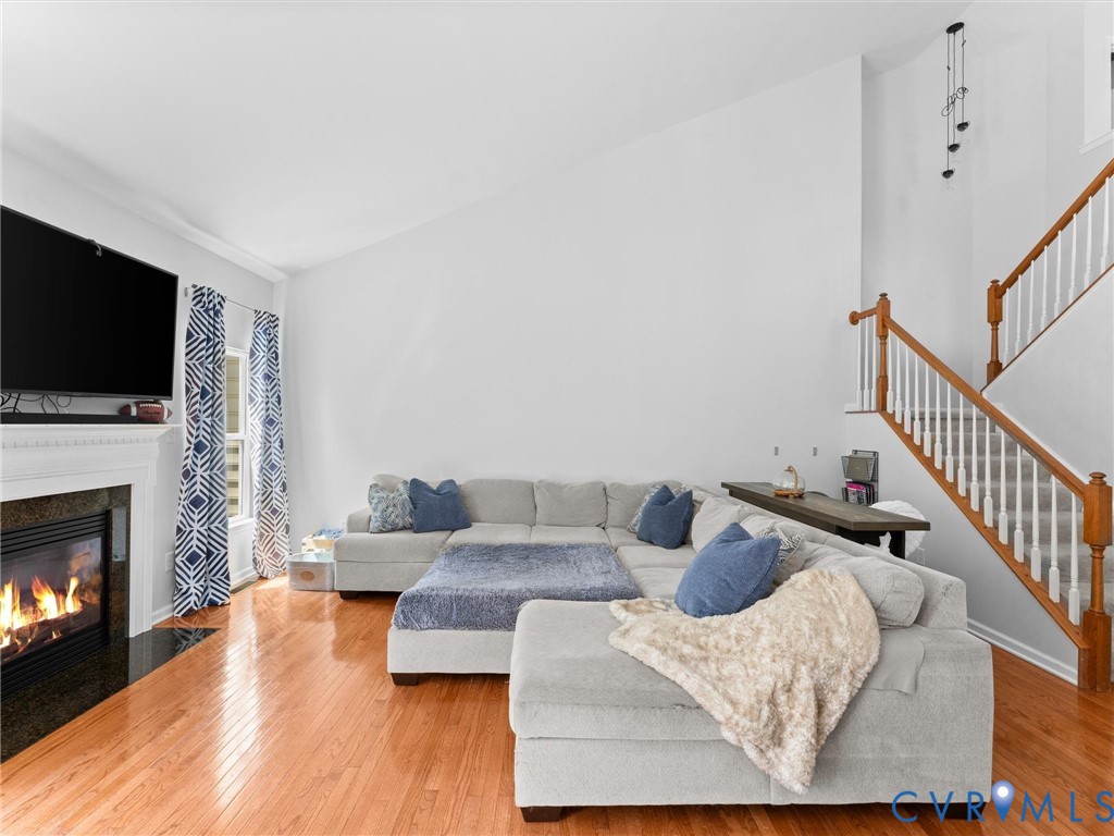 7434 South Franklins Way Quinton, VA 23141 - Photo 11 of 31 Spacious living area featuring high ceilings, wood