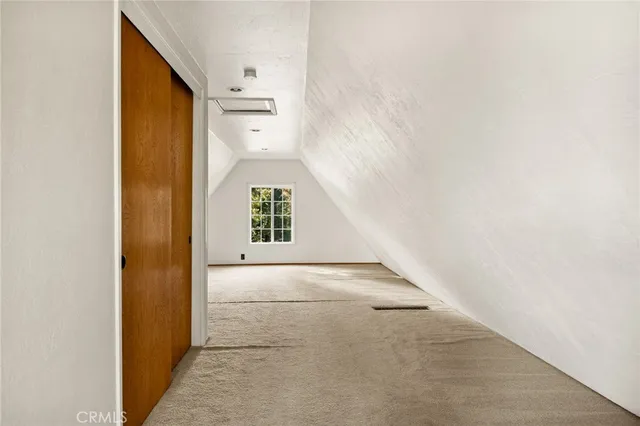 an entryway in room with a window