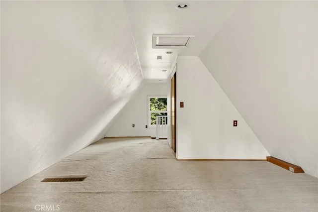 a view of house with a window and wooden floor