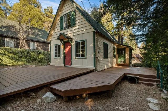 a view of an empty room with a fireplace