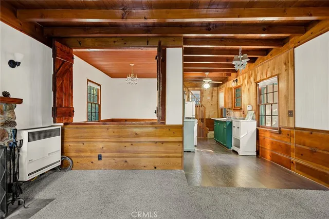 a big room with closet and windows