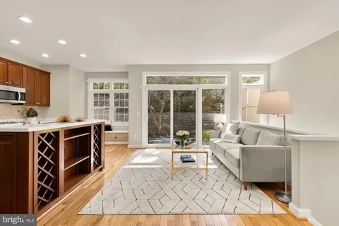 a spacious bedroom with a bed and a couch