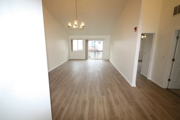 a view of livingroom with hardwood floor and window