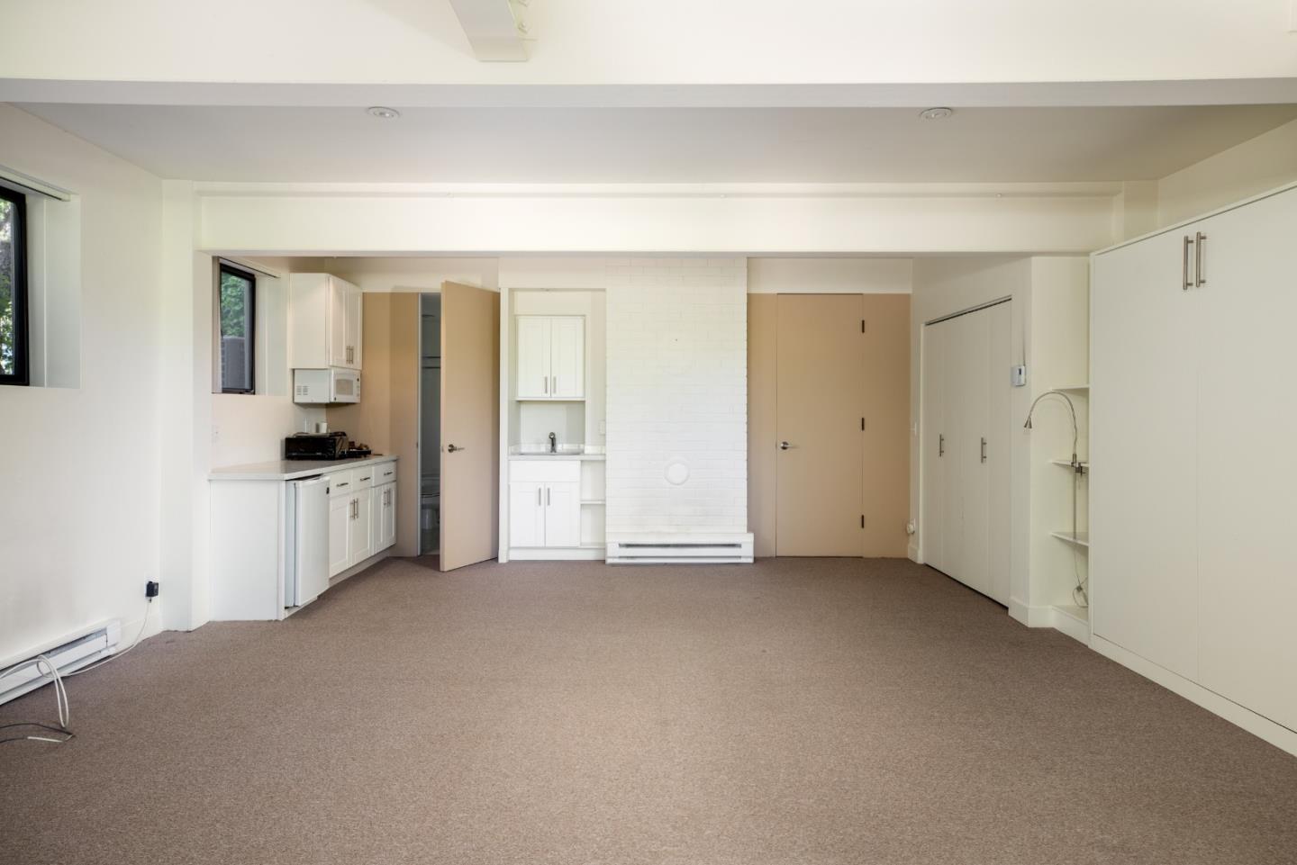 140 Degas Road Portola Valley, CA 94028 - Photo 17 of 31 a view of a big room with closet and windows