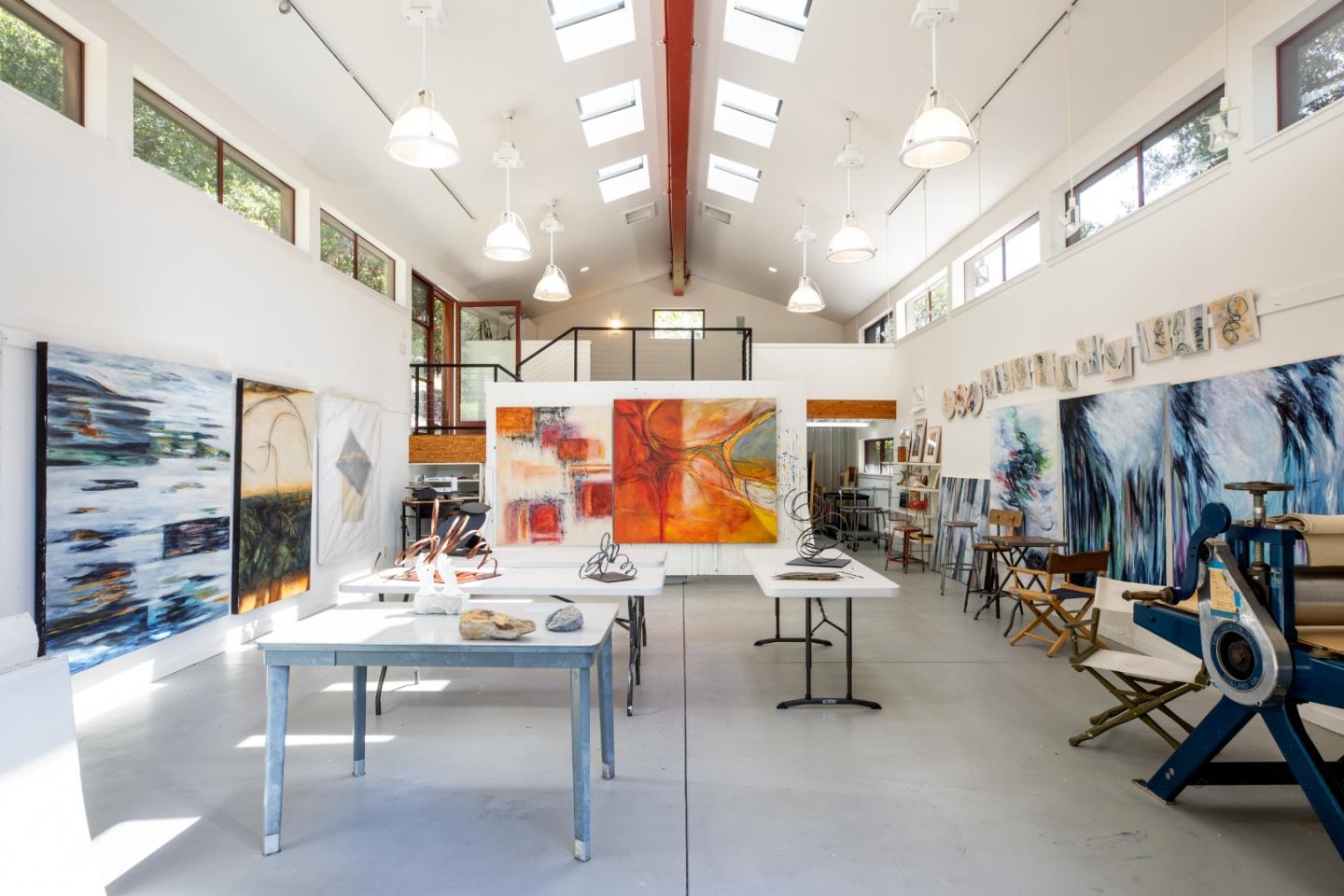 140 Degas Road Portola Valley, CA 94028 - Photo 20 of 31 a living room with lots of furniture and gym equipment