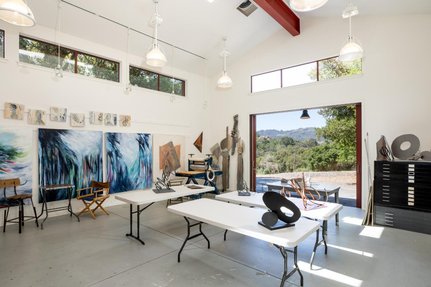 140 Degas Road Portola Valley, CA 94028 - Photo 21 of 31 a living room with patio furniture and a floor to ceiling window