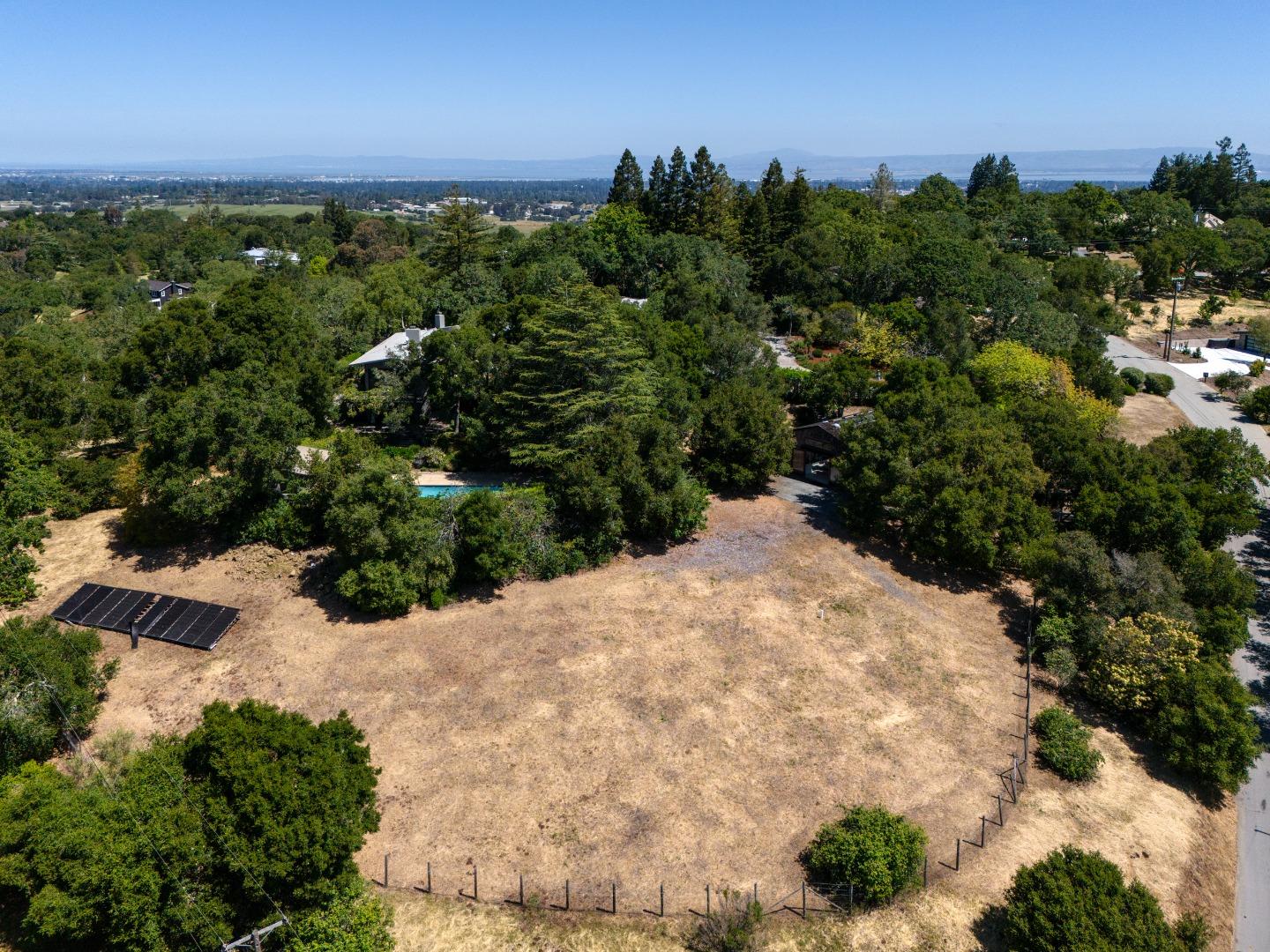 140 Degas Road Portola Valley, CA 94028 - Photo 25 of 31 a view of a yard with a street