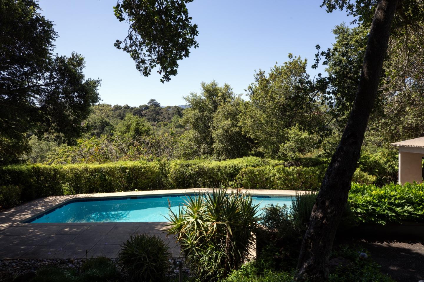 140 Degas Road Portola Valley, CA 94028 - Photo 29 of 31 a view of a lake with a yard