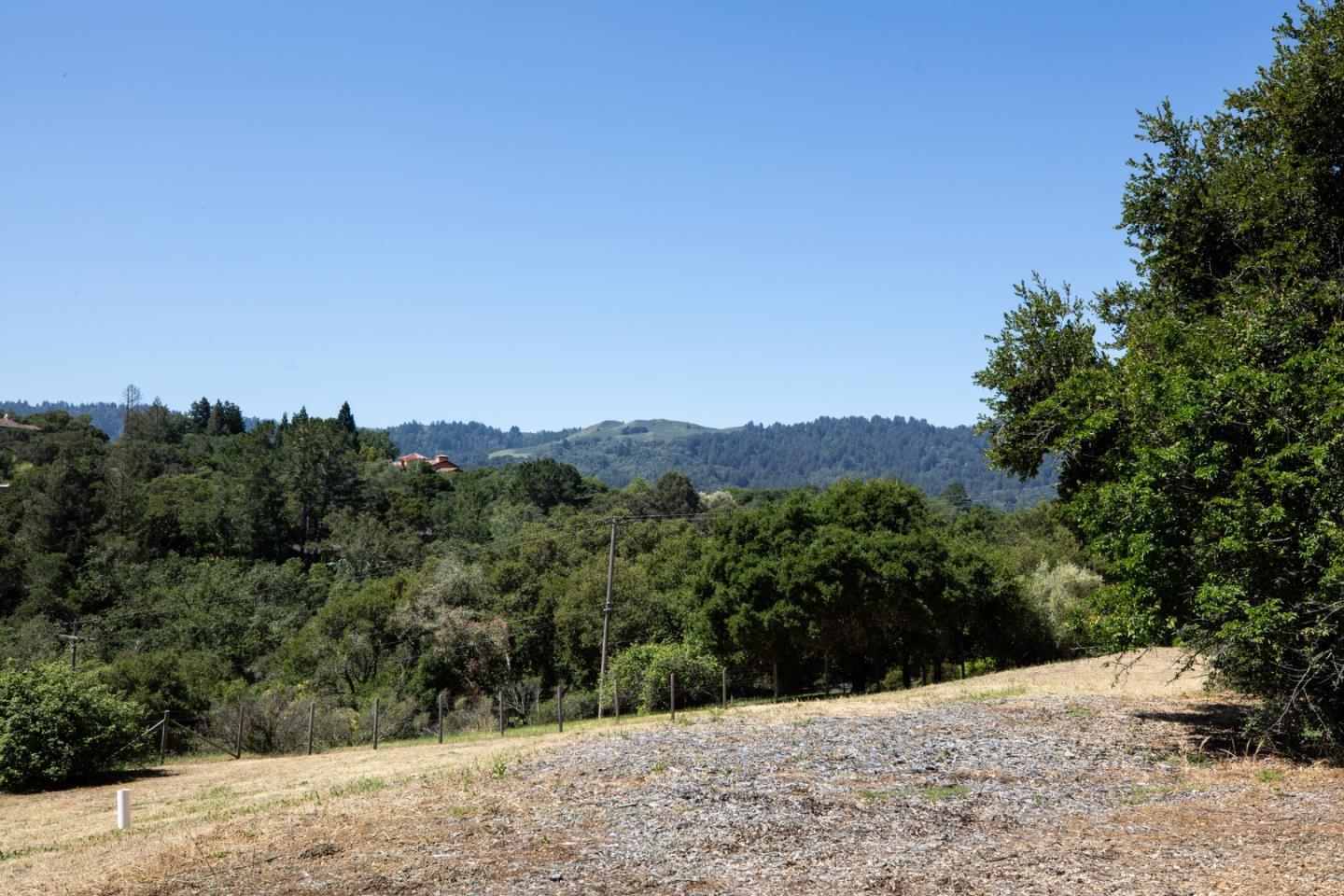 140 Degas Road Portola Valley, CA 94028 - Photo 3 of 31 a view of a mountain range with trees in the background