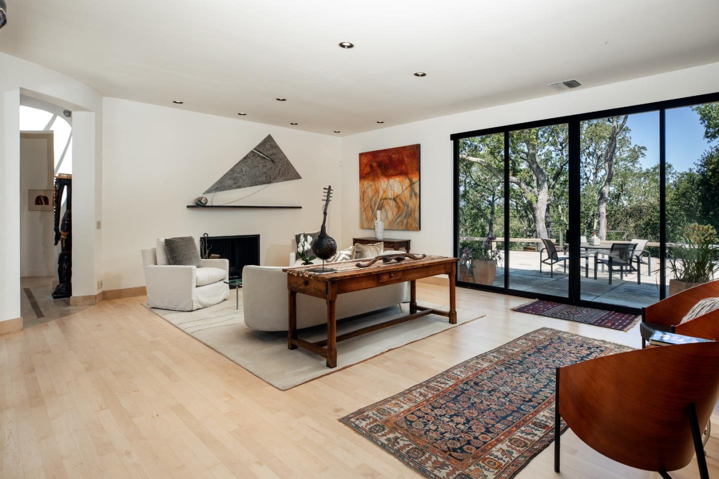 140 Degas Road Portola Valley, CA 94028 - Photo 6 of 31 a bedroom with furniture and large windows