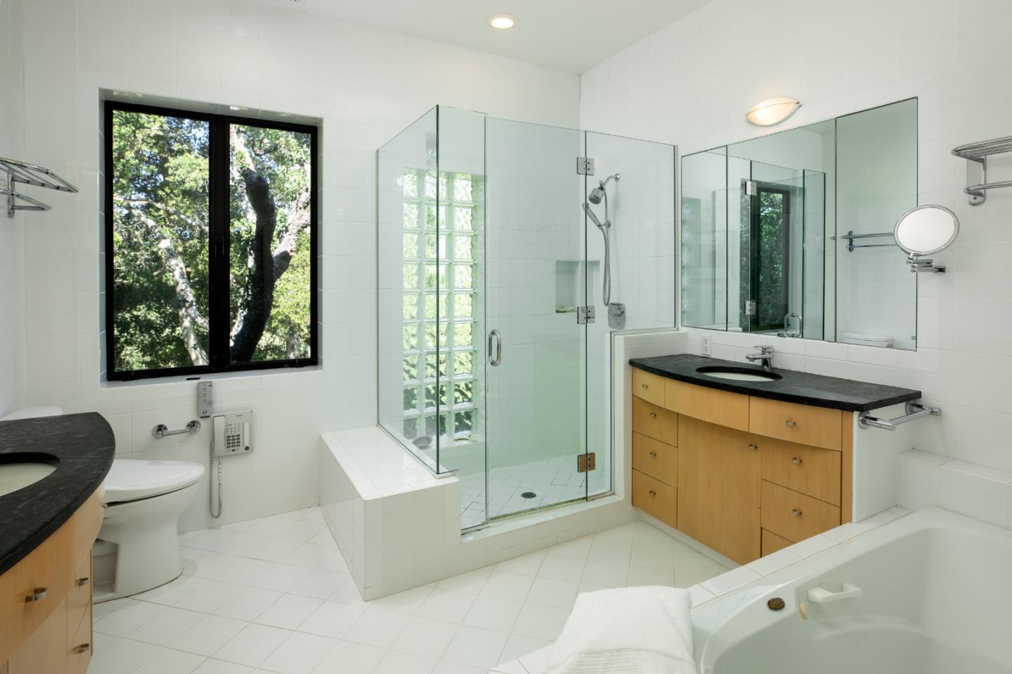 140 Degas Road Portola Valley, CA 94028 - Photo 10 of 31 a bathroom with a sink a toilet and bathtub