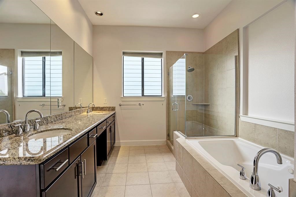 1203 Detering Street Houston, TX 77007 - Photo 8 of 14 Primary bath with full sized shower and separate soaking tub.