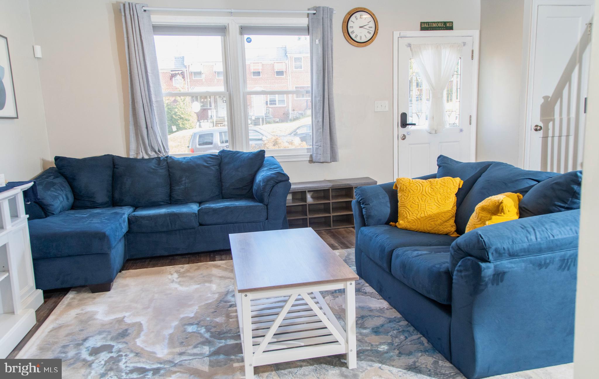 518 Random Road Baltimore, MD 21229 - Photo 2 of 29 a living room with furniture and a window