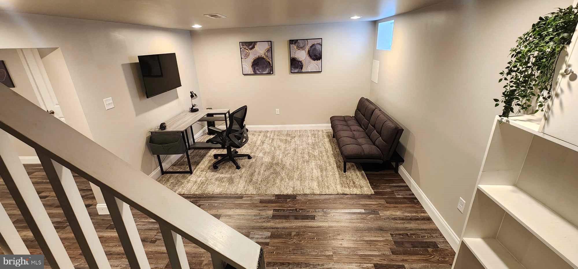 518 Random Road Baltimore, MD 21229 - Photo 23 of 29 a view of living room with furniture and flat screen tv