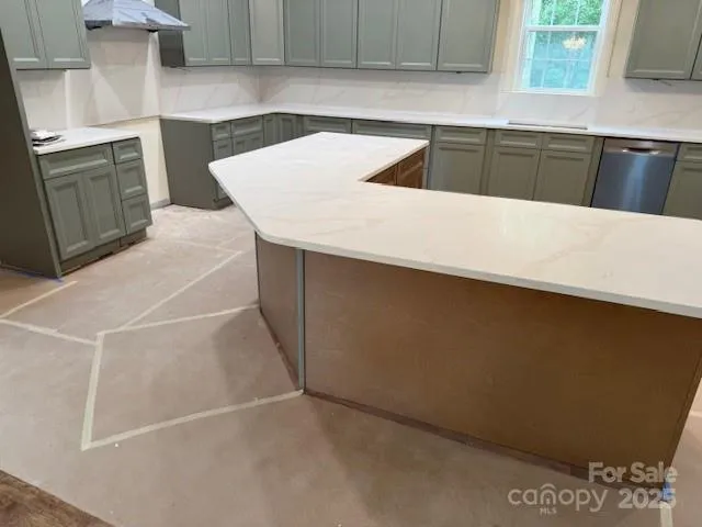 a hallway with an empty room