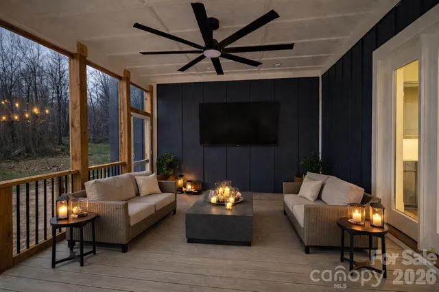 a view of balcony with wooden floor