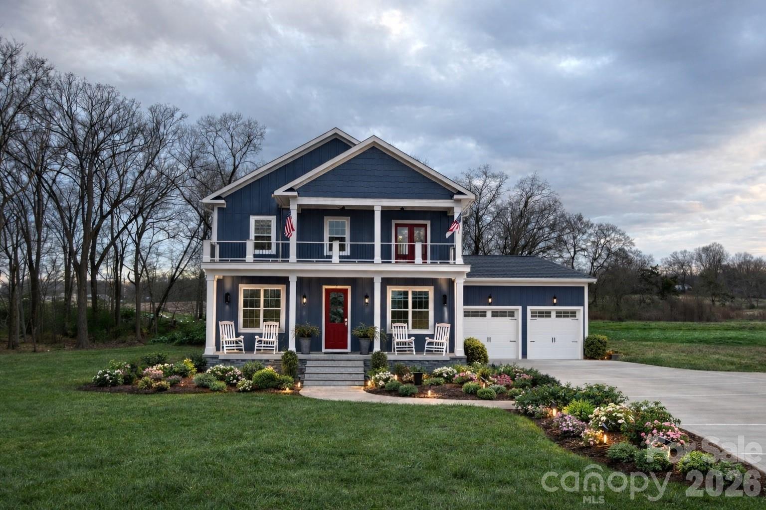 7217 Tesh Road, Unit 5 Monroe, NC 28110 - Photo 2 of 48 front view of a house with a yard