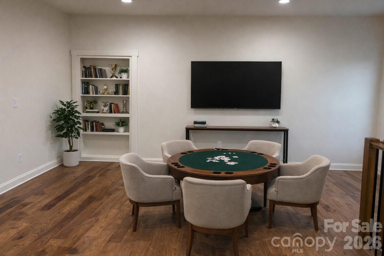 7217 Tesh Road, Unit 5 Monroe, NC 28110 - Photo 23 of 48 a living room with furniture and a flat screen tv