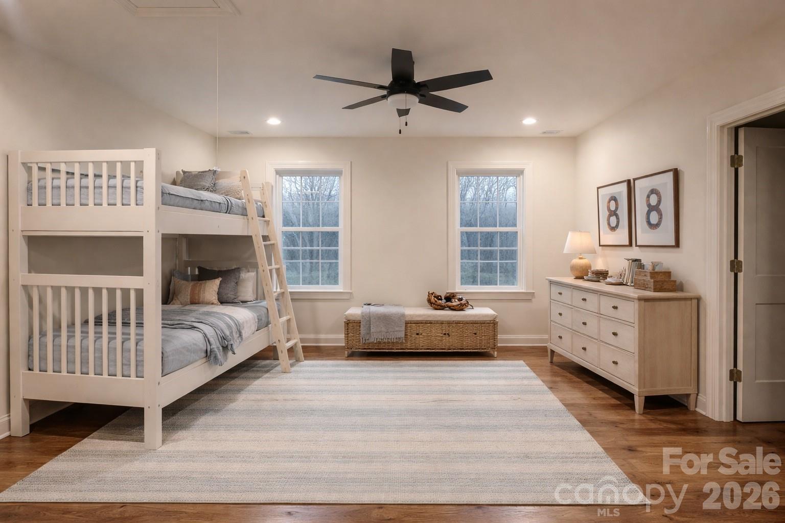 7217 Tesh Road, Unit 5 Monroe, NC 28110 - Photo 31 of 48 a spacious bedroom with a bed and a window