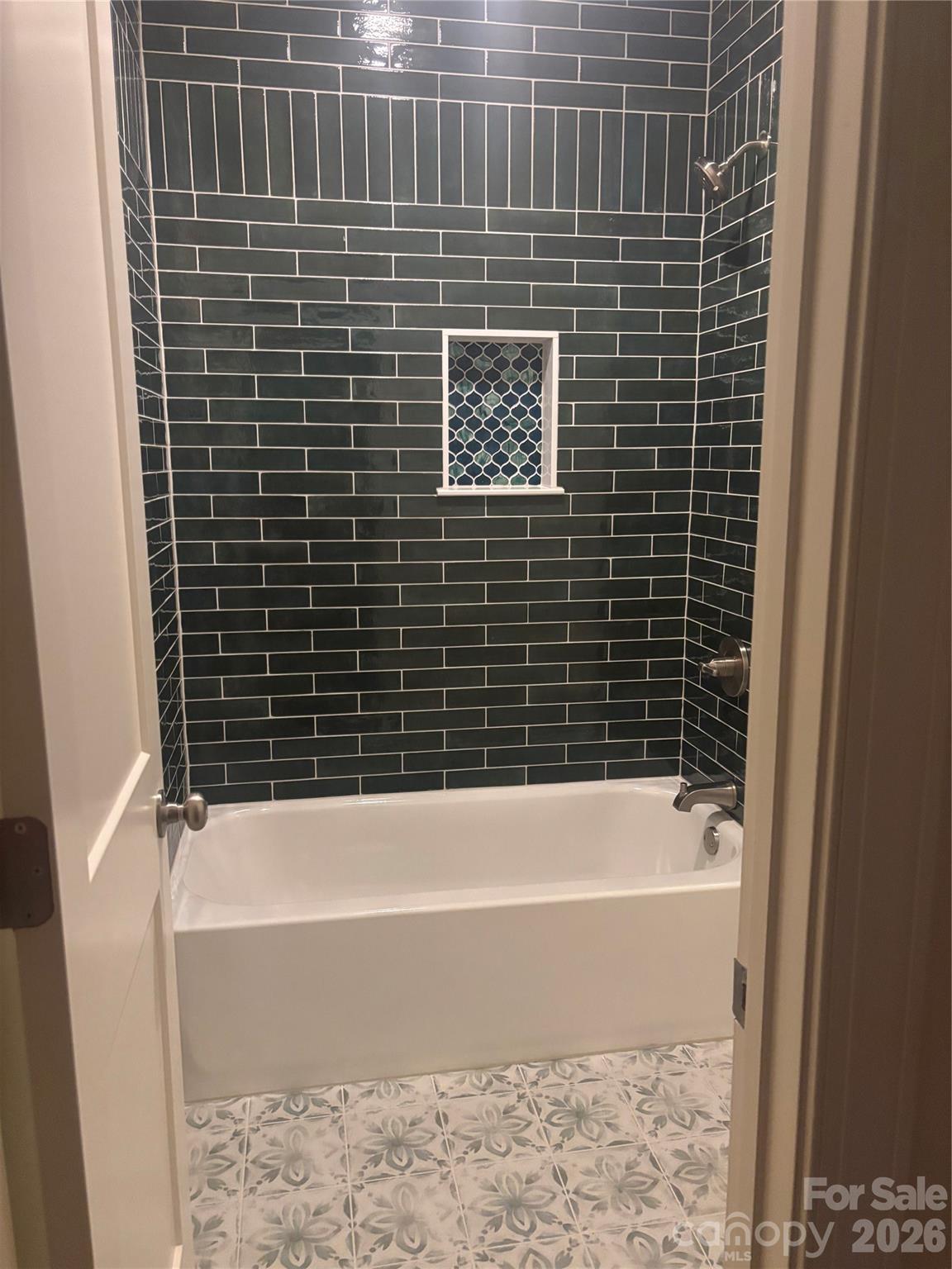 7217 Tesh Road, Unit 5 Monroe, NC 28110 - Photo 33 of 48 a bathroom with a bathtub