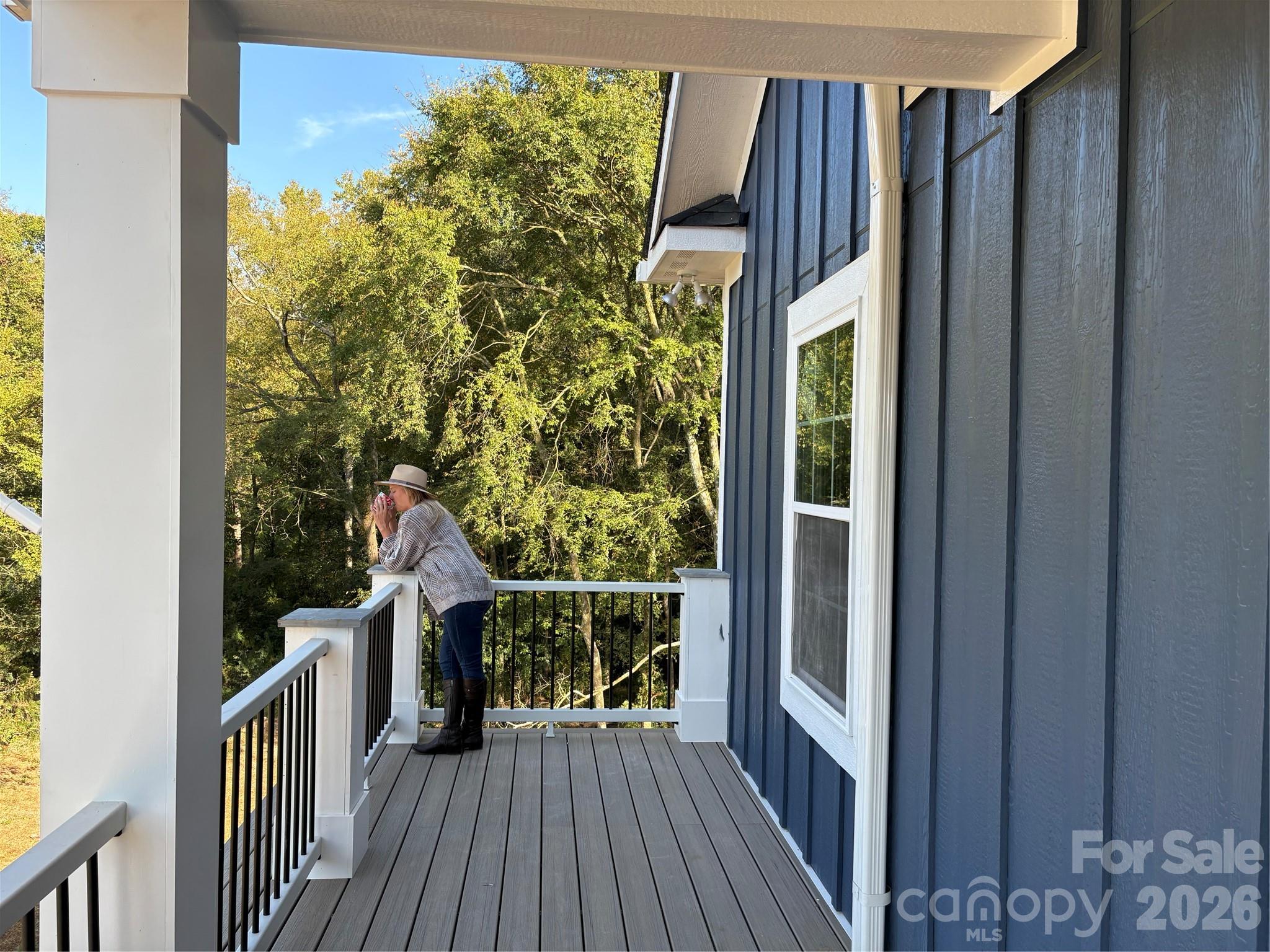 7217 Tesh Road, Unit 5 Monroe, NC 28110 - Photo 43 of 48 a view of balcony with wooden floor