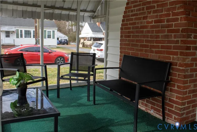 a view of yard with seating area