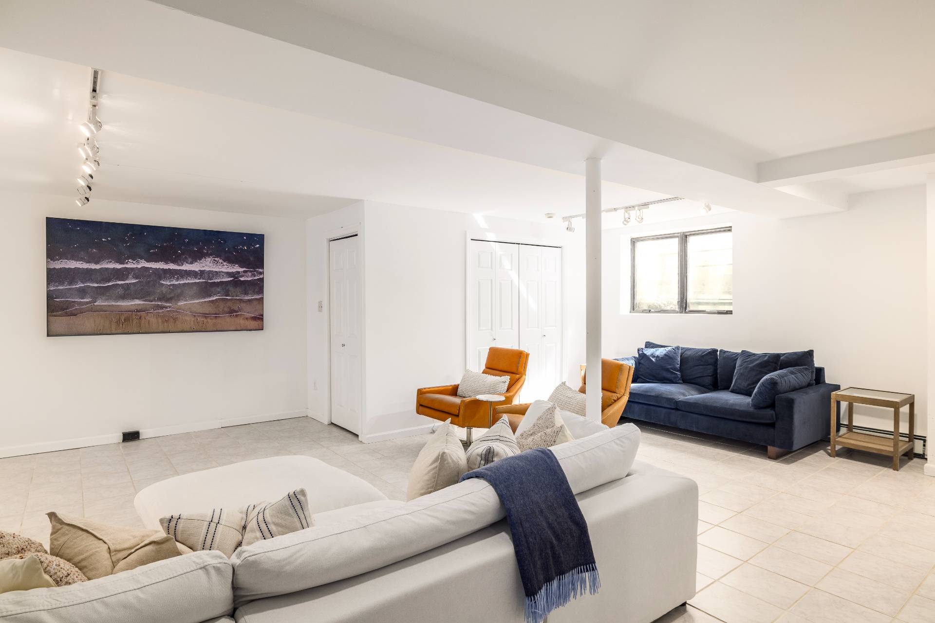 1 High Point Road East Hampton, NY 11937 - Photo 12 of 18 a living room with furniture and a couch