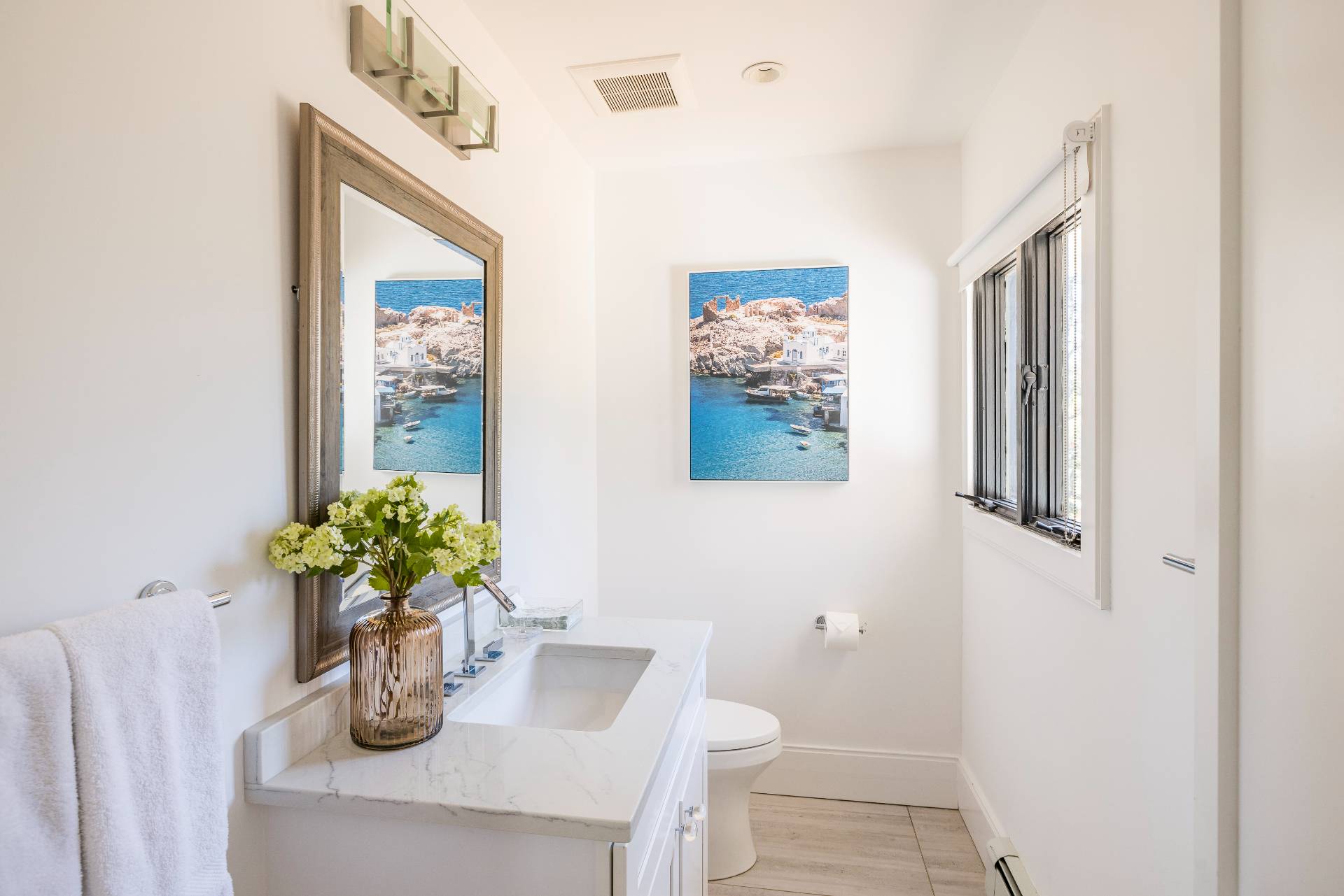 1 High Point Road East Hampton, NY 11937 - Photo 18 of 18 a bathroom with a toilet a sink and a mirror