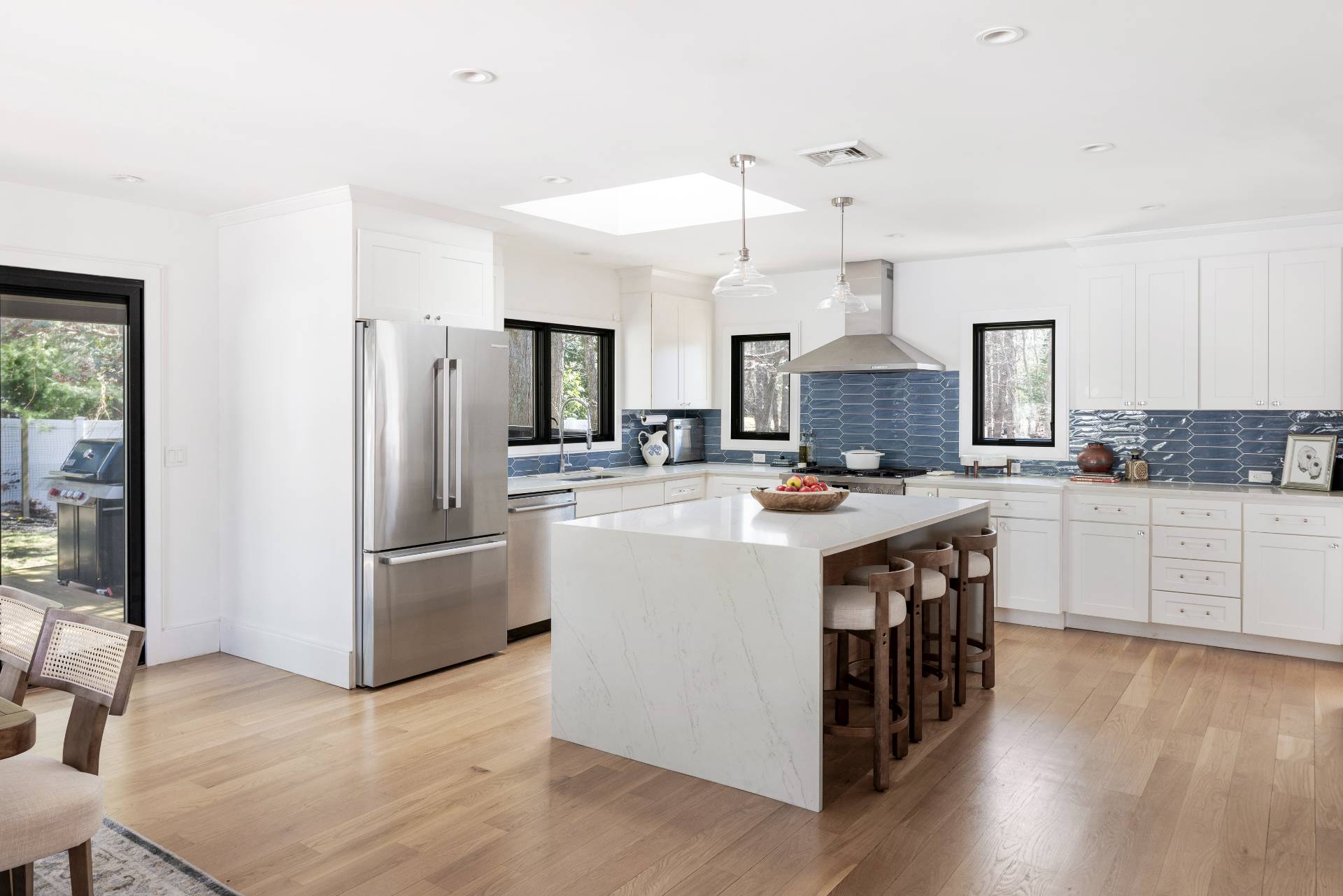 1 High Point Road East Hampton, NY 11937 - Photo 5 of 18 a kitchen with a refrigerator sink and cabinets