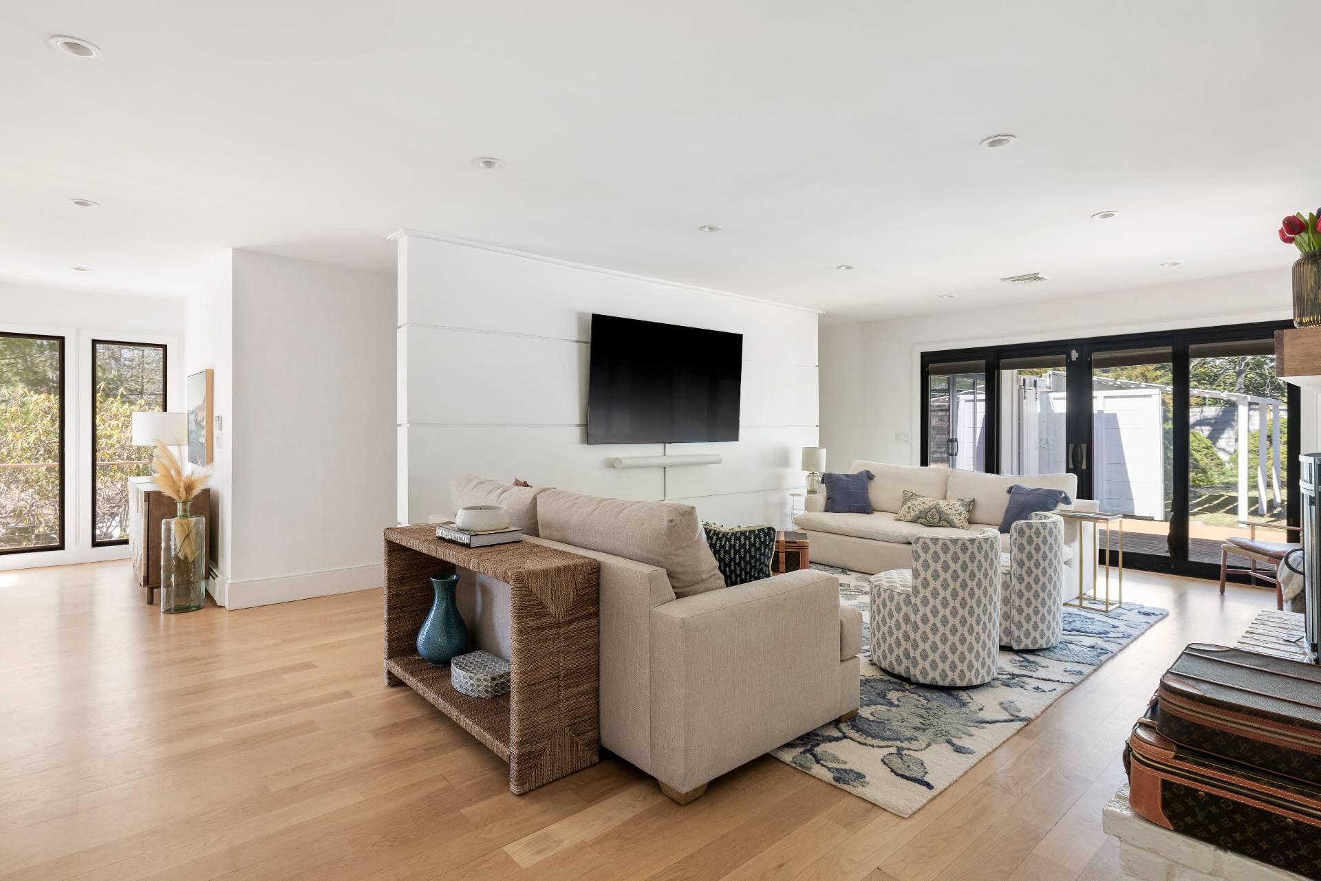 1 High Point Road East Hampton, NY 11937 - Photo 9 of 18 a living room with furniture and a flat screen tv