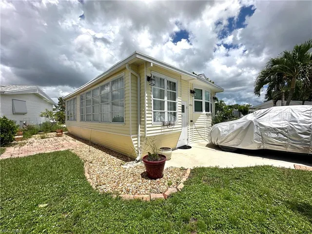a house view with a garden space
