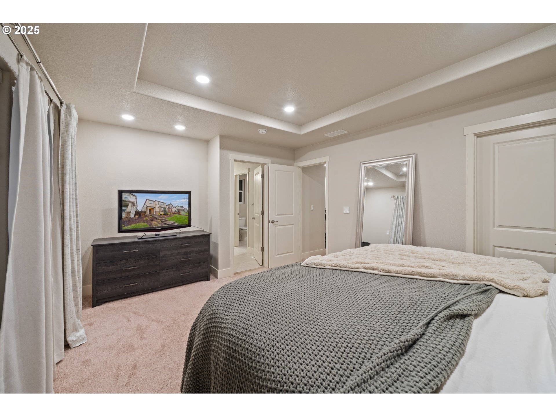 14224 Southwest 169th Avenue Portland, OR 97223 - Photo 17 of 37 a bedroom with a bed and a dresser