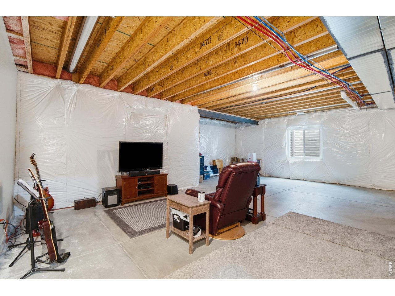 1263 Swainson Road Eaton, CO 80615 - Photo 18 of 29 Unfinished space in the basement waiting for your personal touches - create a recreation space, wet bar, whatever your heart desires!