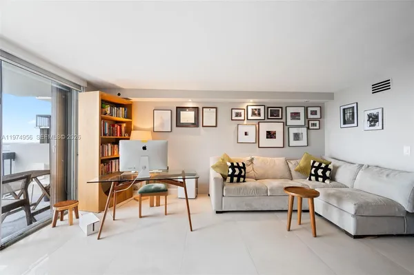 a living room with furniture and a couch