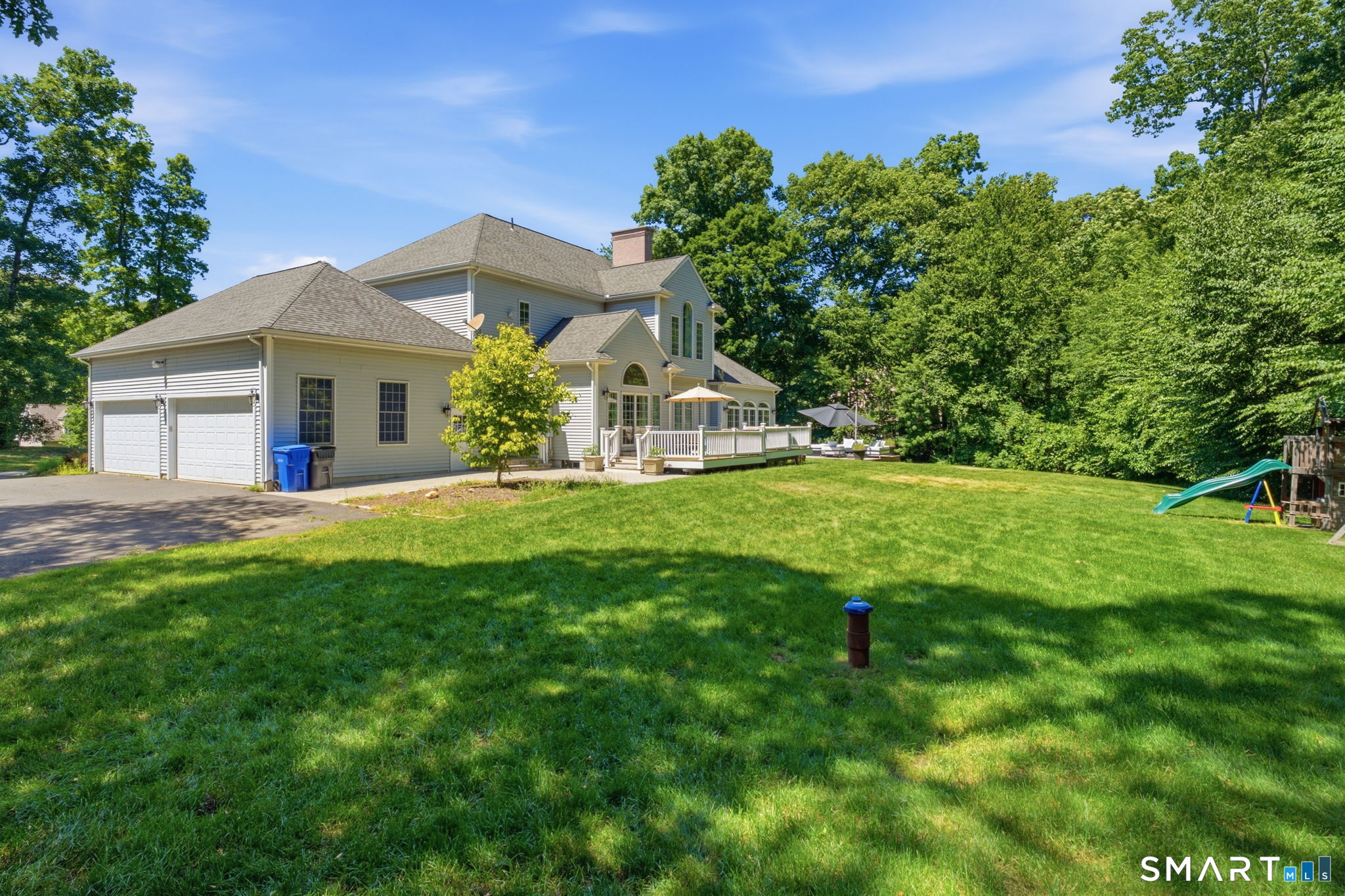 52 Country Club Road Bolton, CT 06043 - Photo 31 of 36 a front view of house with yard and green space