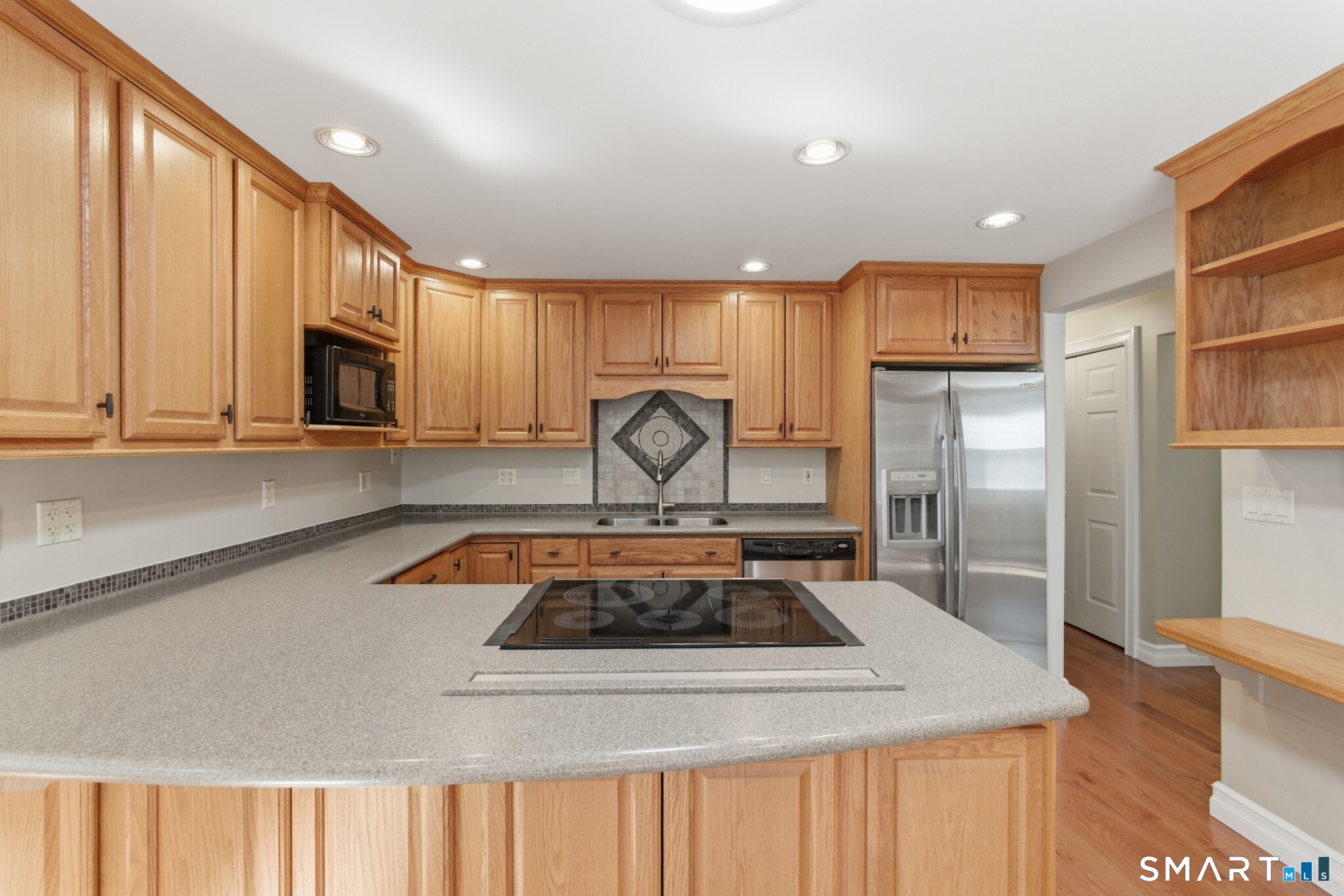 70 Mahoney Road Colchester, CT 06415 - Photo 7 of 40 a kitchen with a stove a refrigerator and a sink