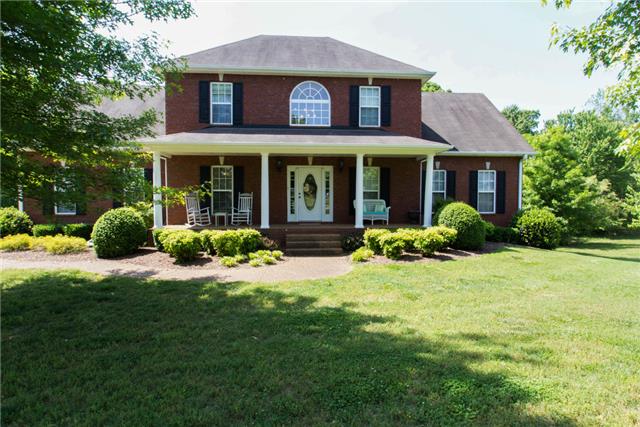 FRONT VIEW OF EXECUTIVE STYLE FULL BRICK HOME 