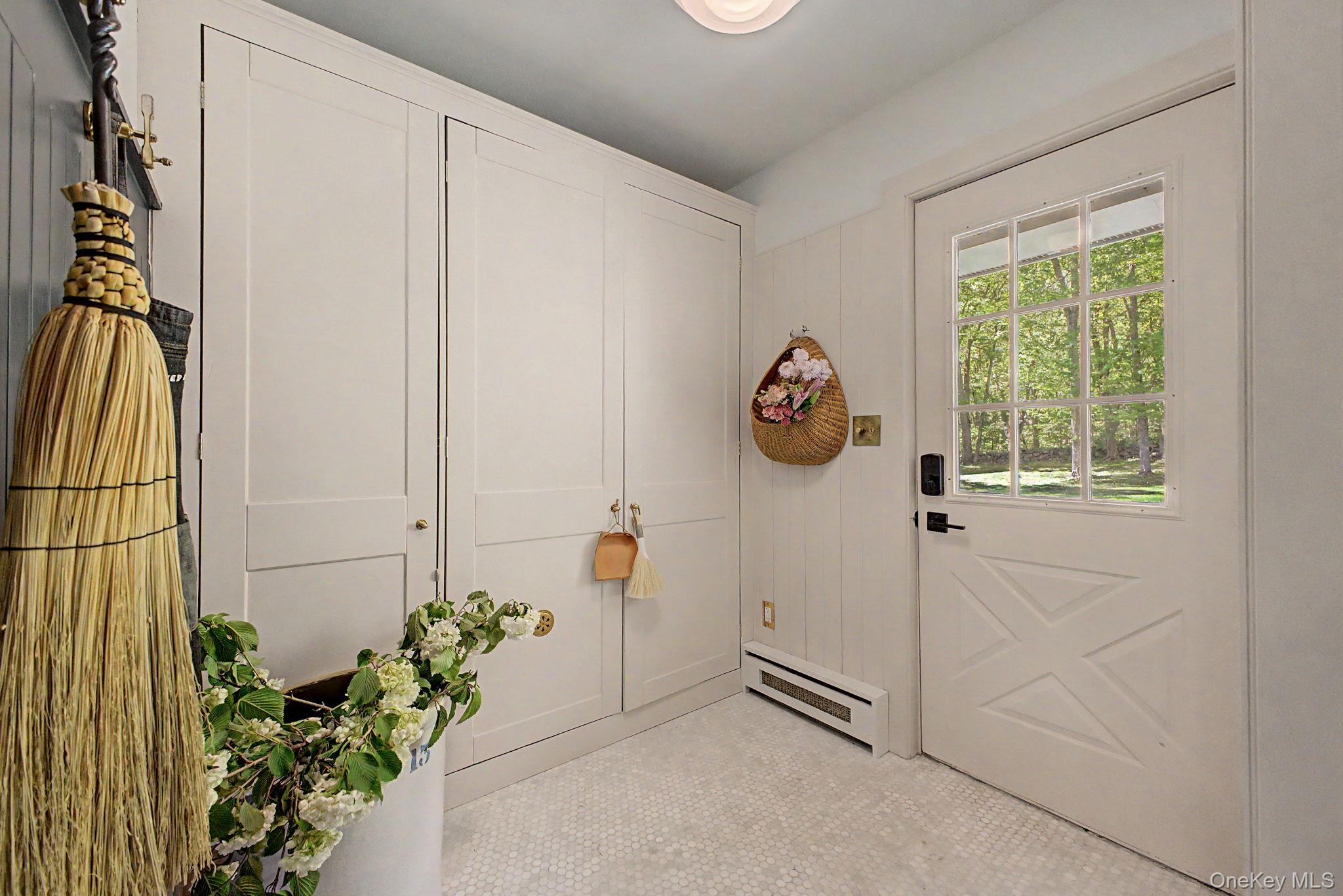 240 Eastwoods Road Pound Ridge, NY 10576 - Photo 17 of 46 a view of entryway with flower pots