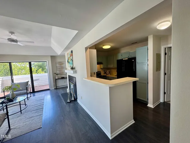 a kitchen with a sink stove and microwave