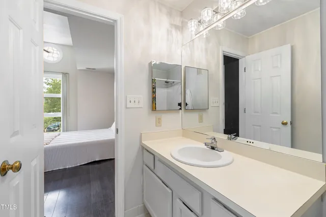 a view of a house with pool and trees