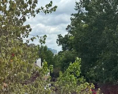 a close view of a sink and a mirror in a kitchen