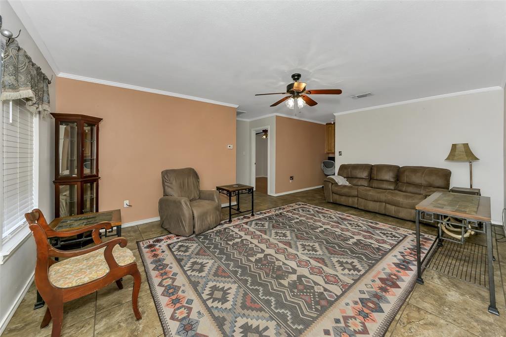 512 Allison Road Springtown, TX 76082 - Photo 13 of 32 a living room with furniture rug and window