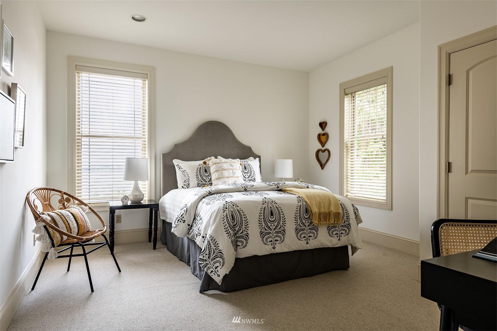 830 35th Avenue Seattle, WA 98122 - Photo 23 of 40 a spacious bedroom with a bed and a couch
