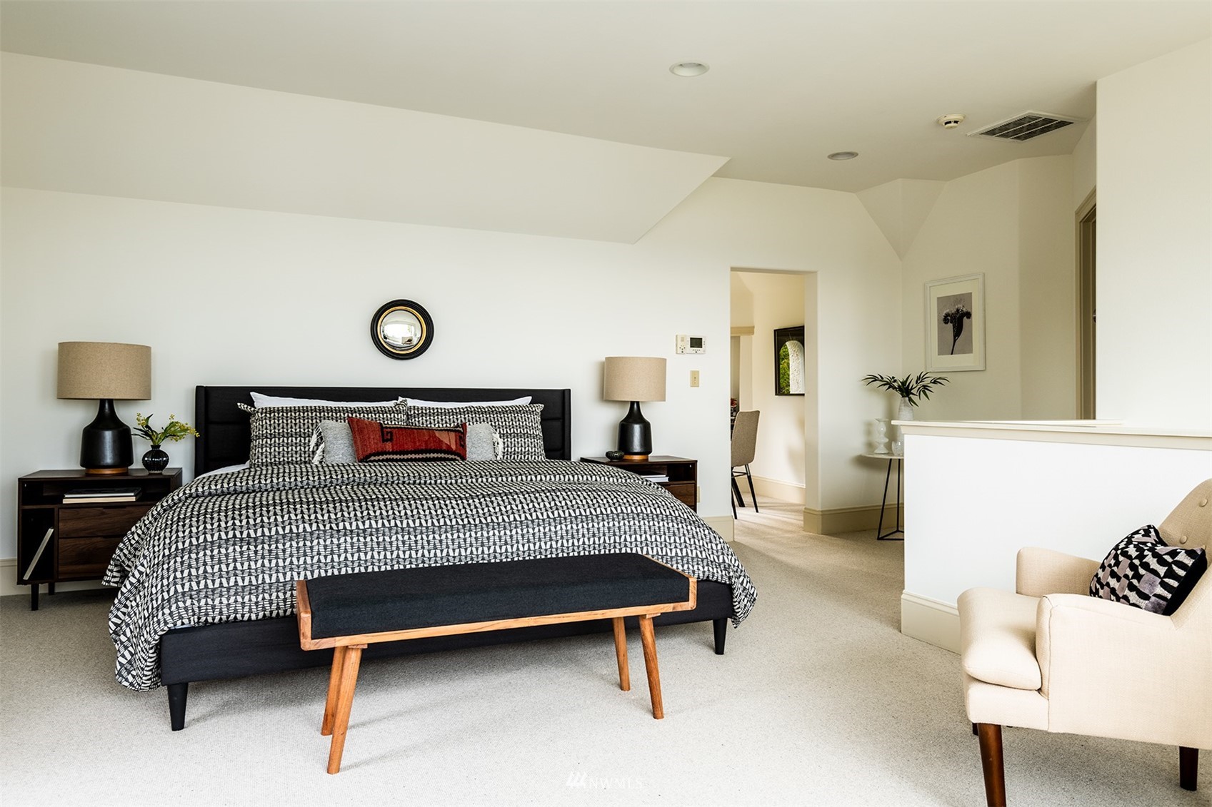 830 35th Avenue Seattle, WA 98122 - Photo 28 of 40 a bedroom with a bed and lamp