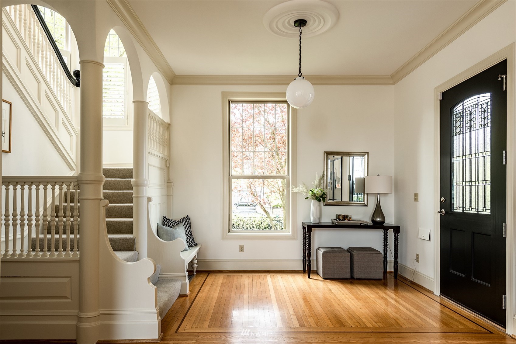 830 35th Avenue Seattle, WA 98122 - Photo 4 of 40 a living room with furniture and a large window