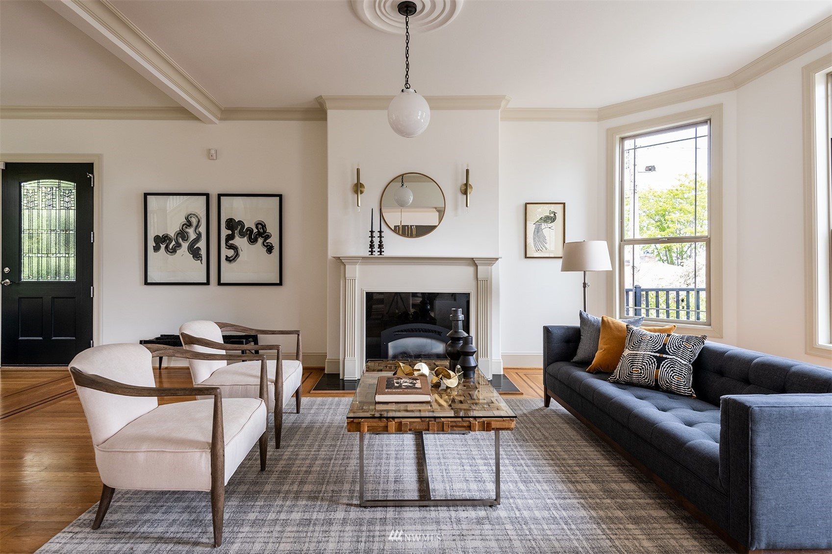 830 35th Avenue Seattle, WA 98122 - Photo 5 of 40 a living room with furniture and a fireplace
