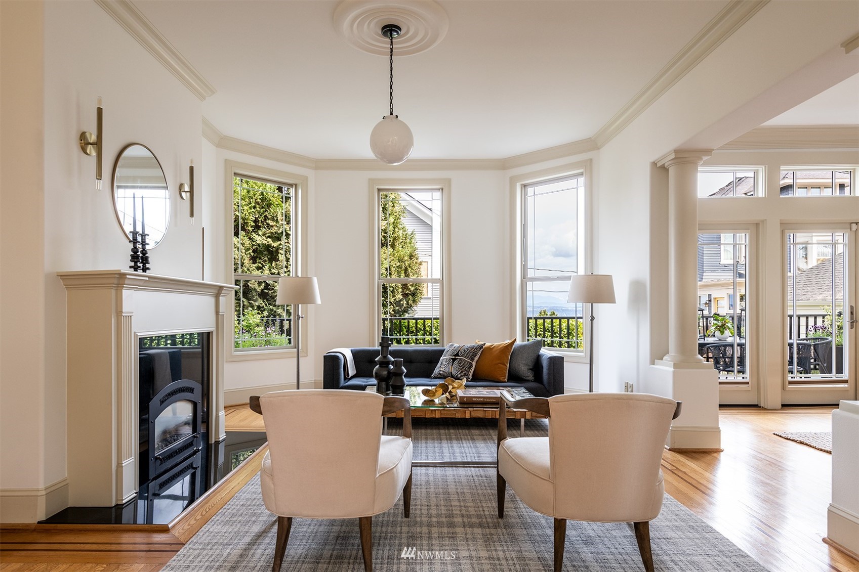 830 35th Avenue Seattle, WA 98122 - Photo 6 of 40 a living room with furniture large window and wooden floor