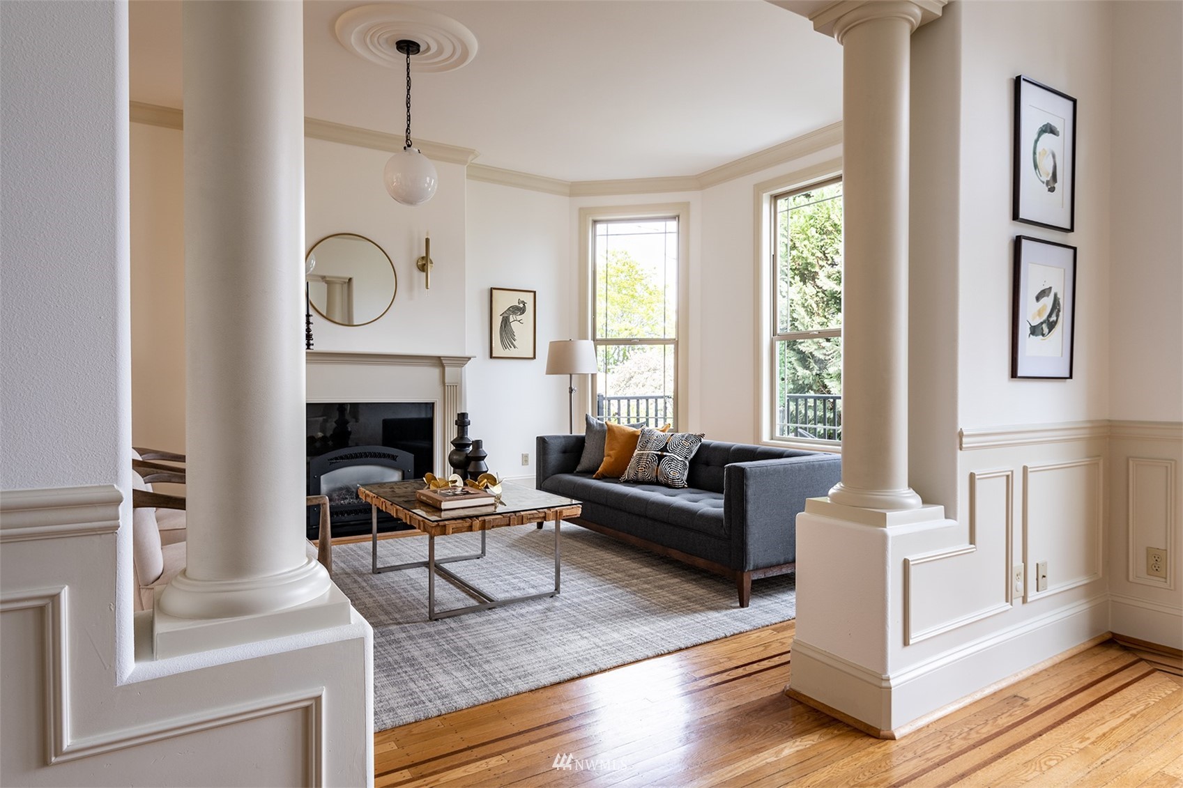 830 35th Avenue Seattle, WA 98122 - Photo 7 of 40 a living room with furniture and a fireplace