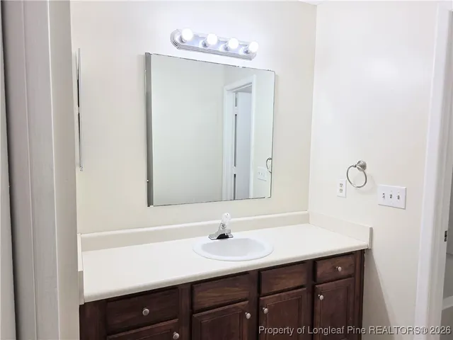 a bathroom with a toilet and a bathtub